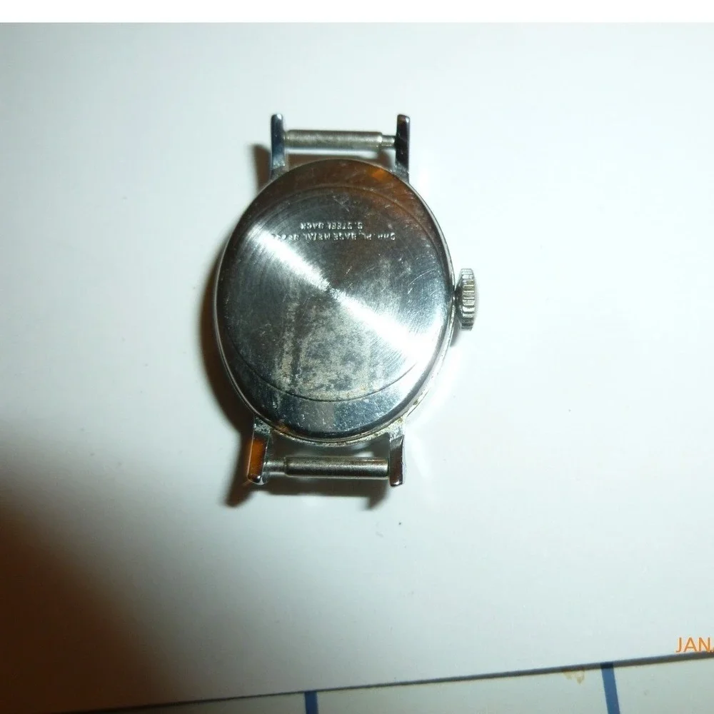 Vintage Timex Womens Oval Silver Tone Mechanical Watch Roman Numeral Dial 22mm